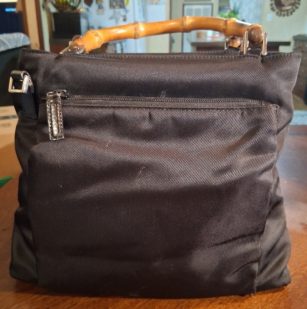Gucci Elegant Black Handbag with Bamboo Handle